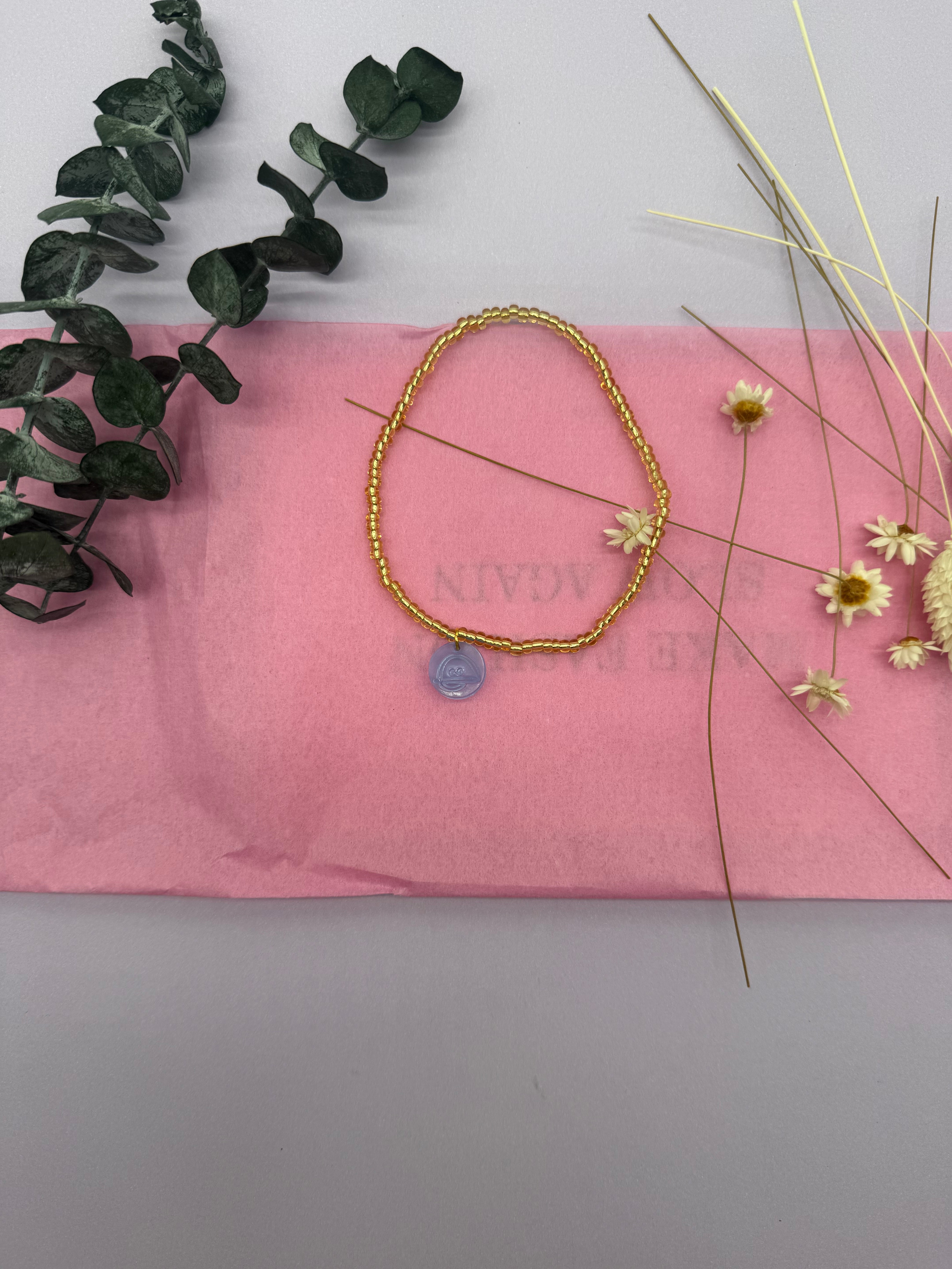 Fußbändchen mit Neon-BAIZO-Smileyanhänger